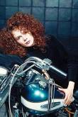 Woman and Blue Harley-Davidson